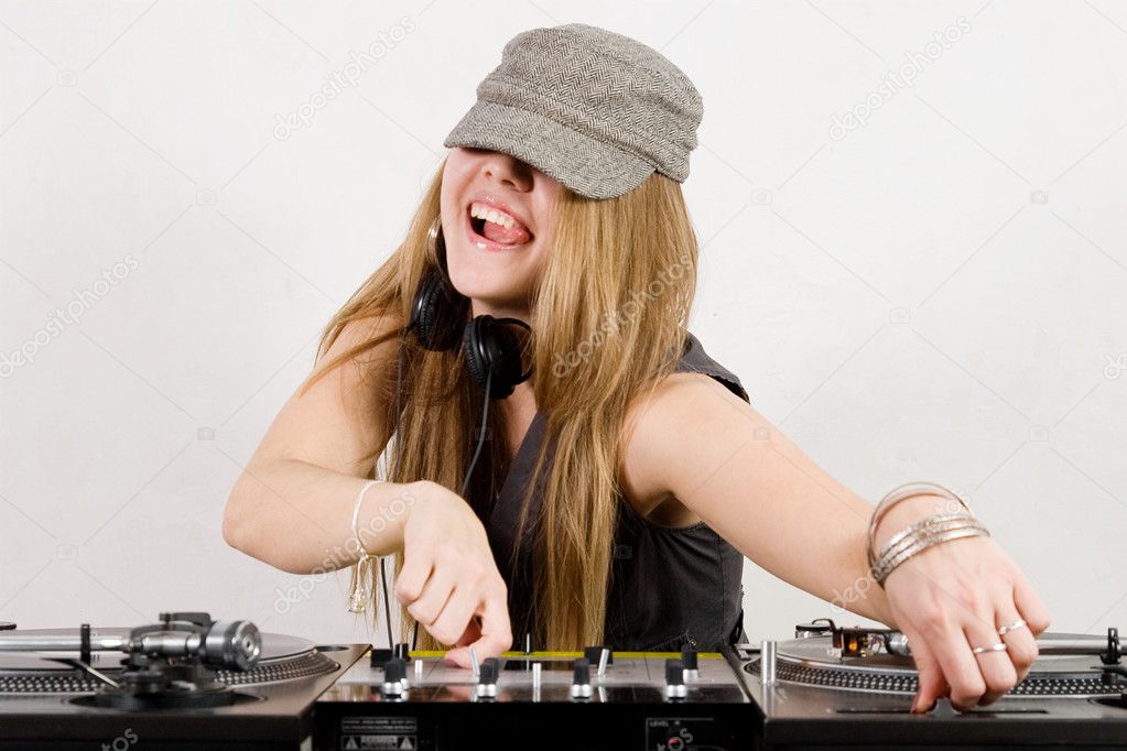 Female DJ adjusting sound level and pitch