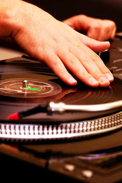 Hip-hop DJ scratching the record — Stock Photo, Image
