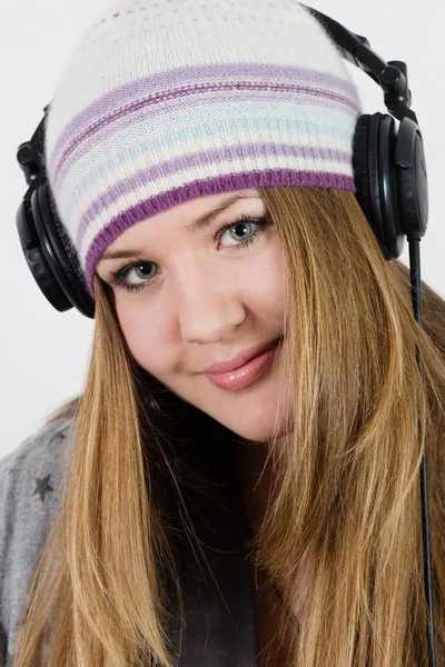 Portret dziewczynki w słuchawkach — Zdjęcie stockowe