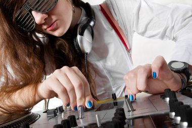 Female DJ playing music from vinyl clipart