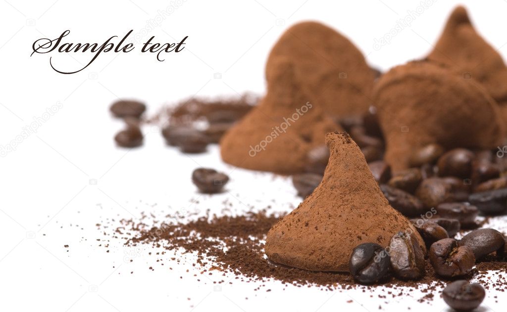 Chocolate truffle, coffe beans and cocoa isolated ovtr white