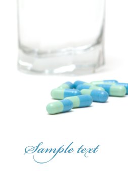 Blue-green pills clipart