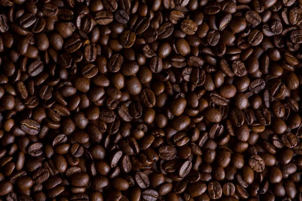 Dunkle Kaffeebohnen Hintergrund — Stockfoto
