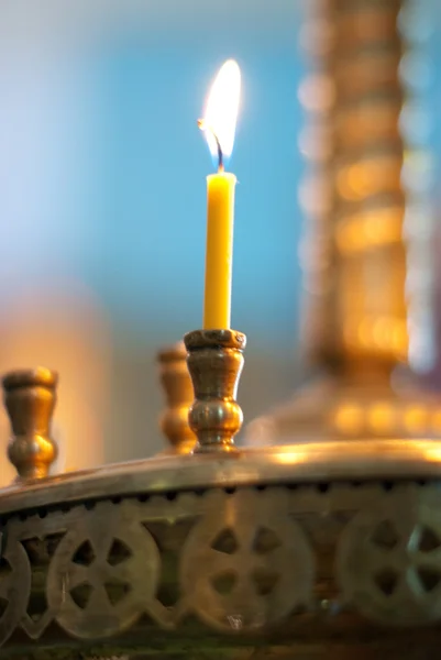 stock image Candle on a candlestick in tample