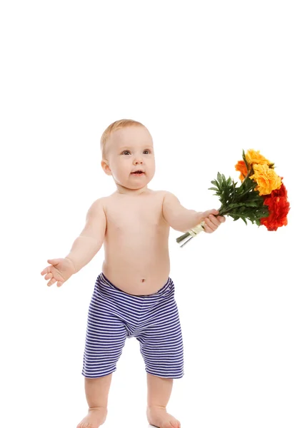 Baby met bloemen — Stockfoto