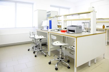 Modern interior of biological laboratoratory in research center clipart