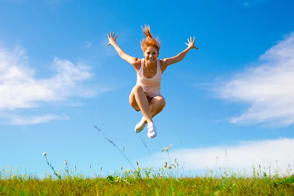 Jumping girl Stock Image