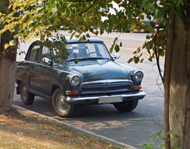 The legend of the Russian car industry - GAZ-21 Volga. The car, which won the appreciation of the exhibition in Geneva. clipart