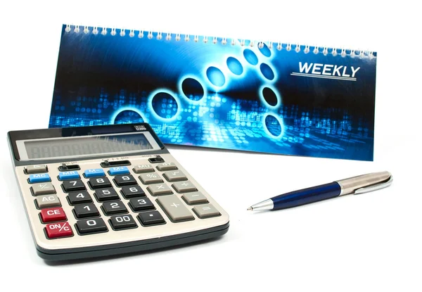 Calculator and a pen — Stock Photo, Image