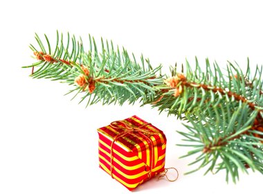 New Year's gift under the fir trees clipart