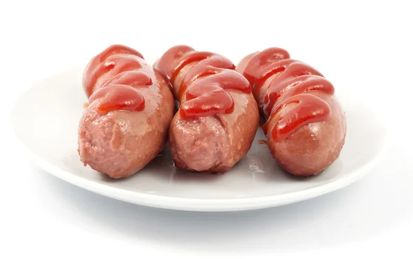 Sausages on a plate Royalty Free Stock Images
