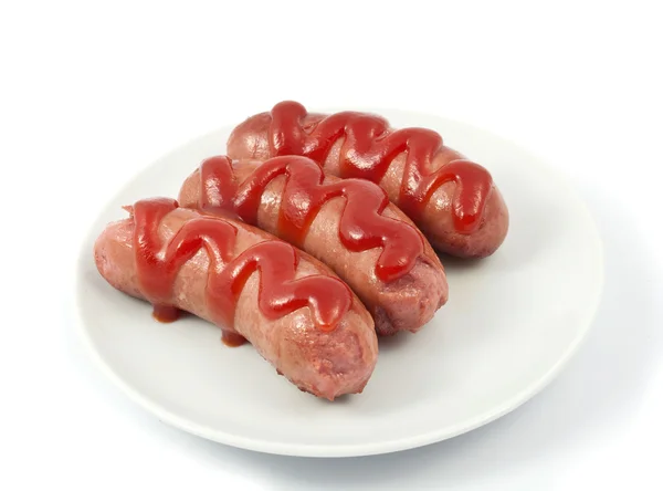 Sausages on a plate Royalty Free Stock Photos