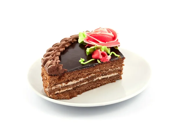 Pedazo de pastel en un plato — Foto de Stock