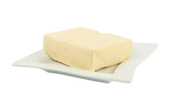 Máslo na talíři — Stock fotografie