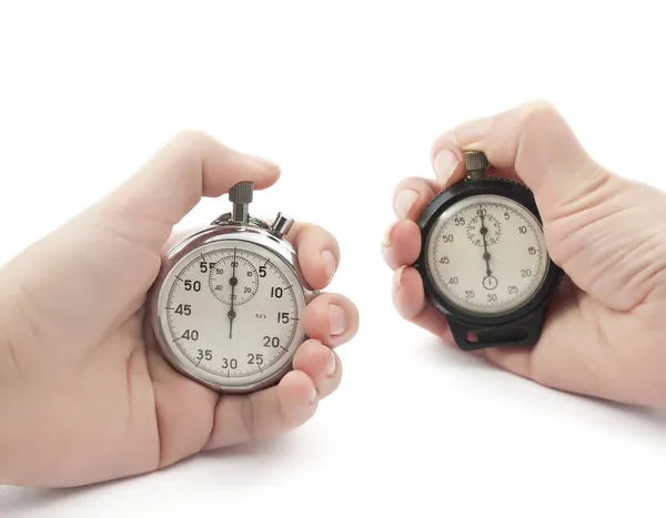 Beyaz Zemin Üzerine Ellerinde Kronometreleri — Stok fotoğraf