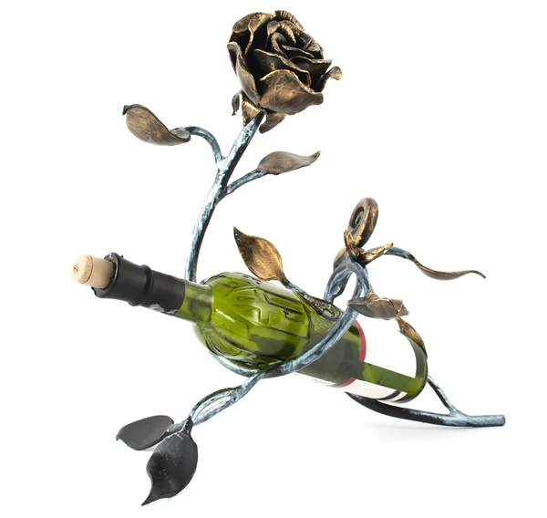 stock image Metal rose and a bottle of wine