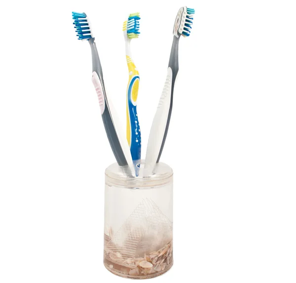Cepillos de dientes en un vaso — Foto de Stock