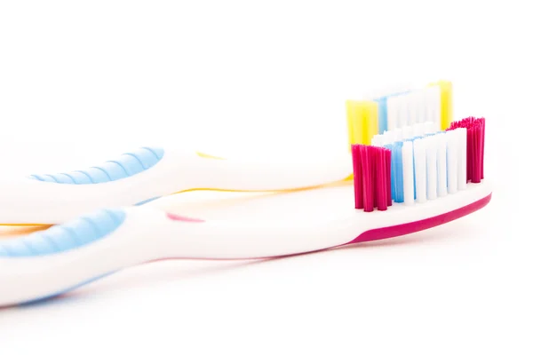 Cepillos de dientes aislados en blanco —  Fotos de Stock