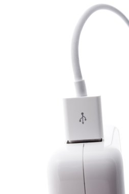 Close up shot of plugged-in usb cable isolated on white clipart