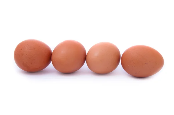 Quatro ovos em branco — Fotografia de Stock