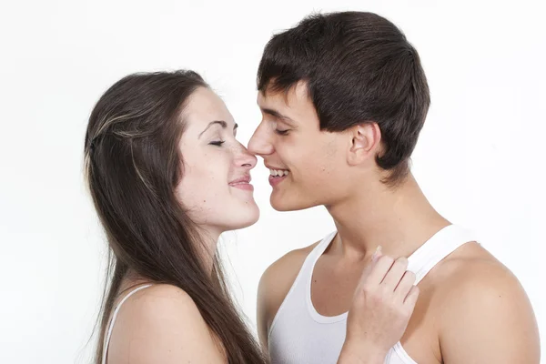 Beautiful young kissing couple — Stock Photo, Image