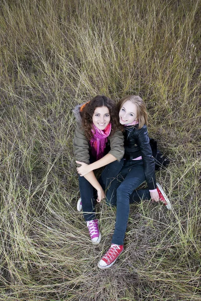 Autumn portrait of two young women — Stock Photo, Image