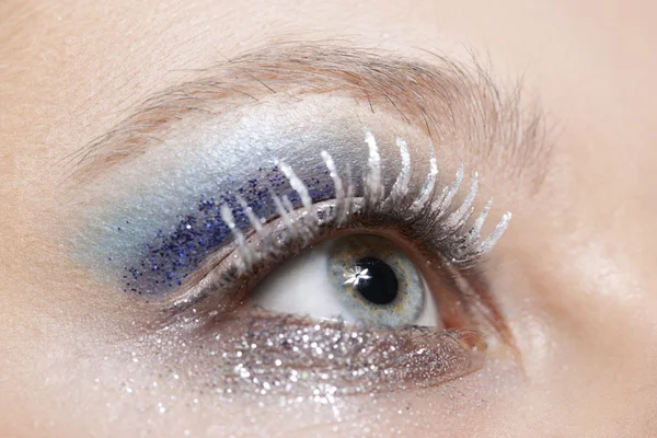 stock image Eye with blue and silver sparkle make-up