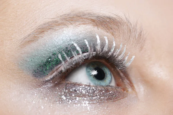 stock image Eye with blue and silver sparkle make-up