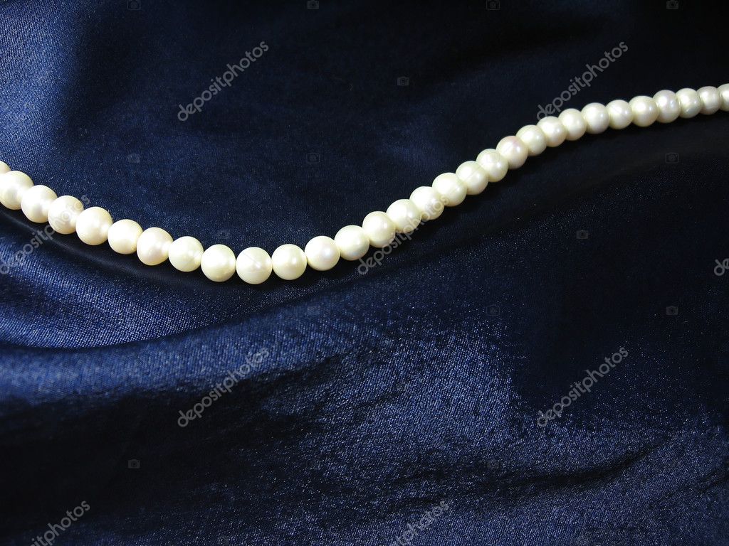 Beautiful White Pearls Background Dark Blue Silk Stock Photo by