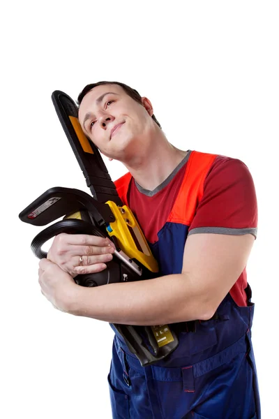 Romantic worker with the chainsaw — Stock Photo, Image