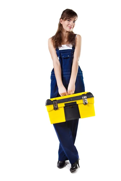 Pretty woman in coveralls with the case — Stock Photo, Image