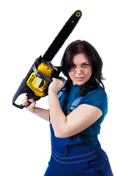 Pretty woman in coveralls with the chainsaw — Stock Photo, Image