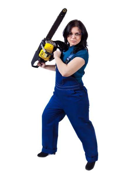Pretty woman in coveralls with the chainsaw — Stock Photo, Image