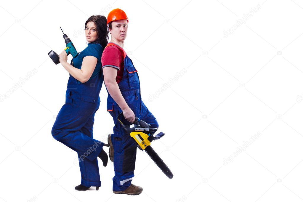 Man and woman with the chainsaw and drill are standing back to b