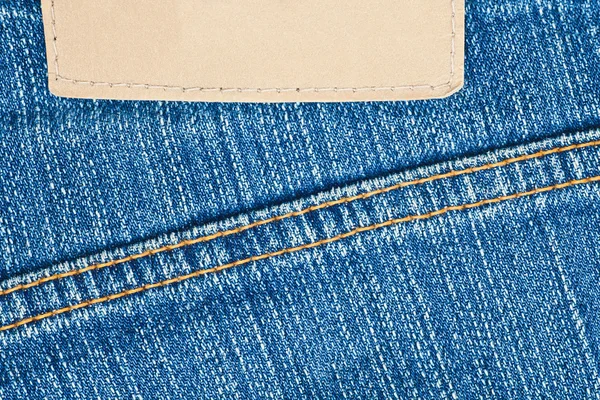 Etiqueta de couro em branco em jeans — Fotografia de Stock