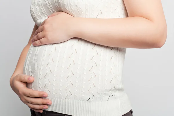 Mulher grávida em terno e jaqueta perfil — Fotografia de Stock
