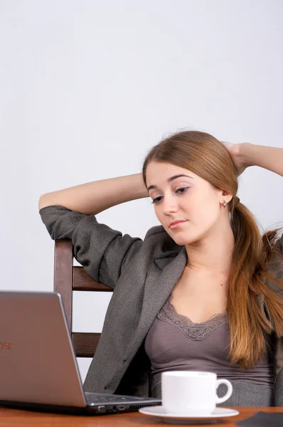Young businesswoman resting at her desk — Stock Photo, Image