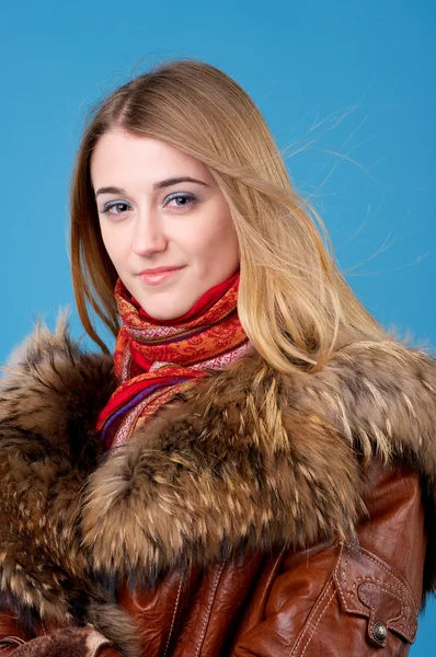 Portrait of beautiful female in sheepskin coat — Stock Photo, Image