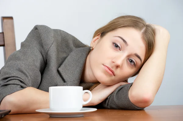 Tired businesswoman looking to the camera — Stock Photo, Image