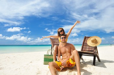 Couple on a beach clipart