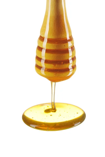 Диппер и мед — стоковое фото