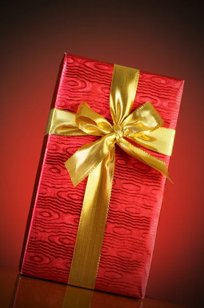 Gift box against gradient background Royalty Free Stock Images