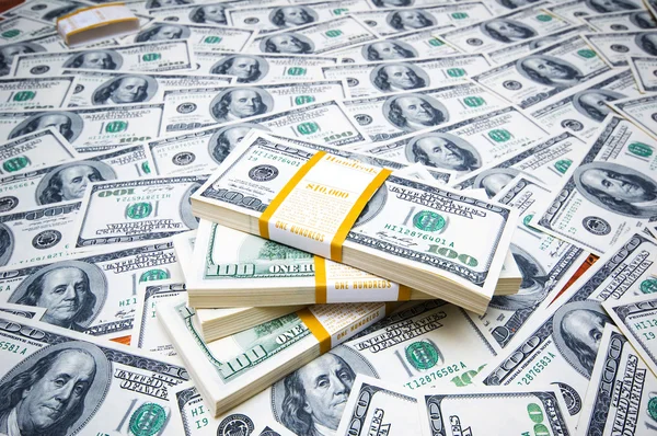 Stack dollar på pengar bakgrund — Stockfoto