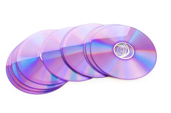 Многие DVD изолированы на белом фоне — стоковое фото