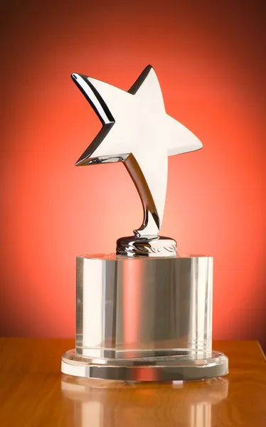 Star award against red gradient background — Stock Photo, Image