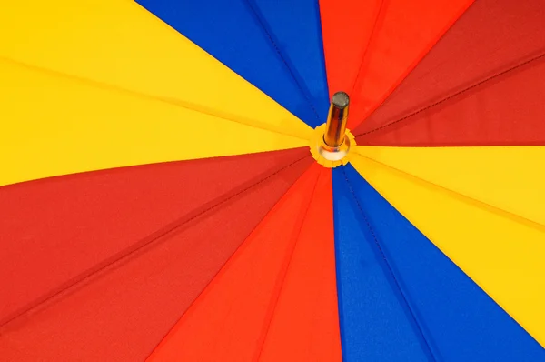 Primer plano de paraguas colorido multisectorial —  Fotos de Stock