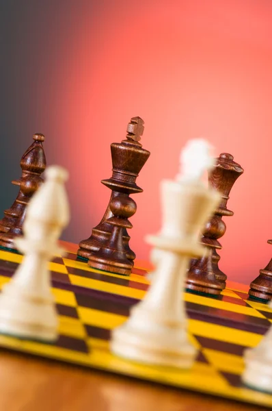 Chess concept with pieces on the board — Stock Photo, Image