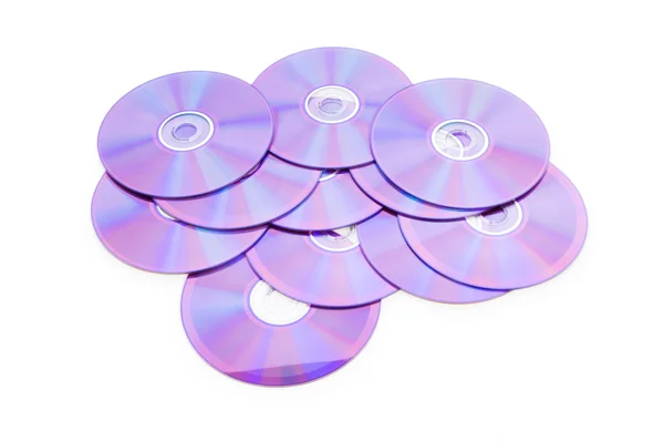 Molti DVD isolati sullo sfondo bianco — Foto Stock