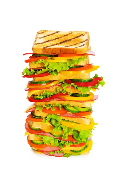 Beyaz arkaplanda izole edilmiş dev sandviç. — Stok fotoğraf