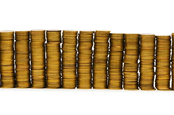 Primer plano de las pilas de monedas de oro —  Fotos de Stock